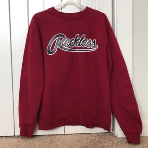 Young and reckless red crew pullover